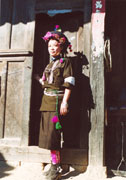 An Achang Girl Wearing Flowers on her Head